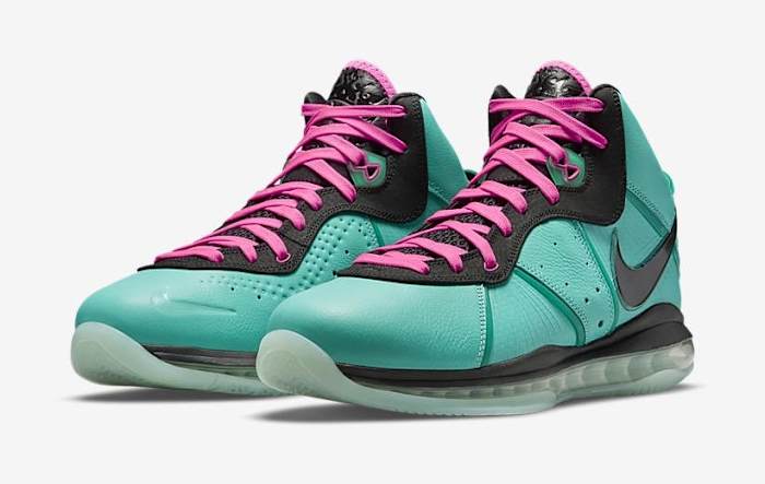 Side view of LeBron James' teal and black Nike sneakers.